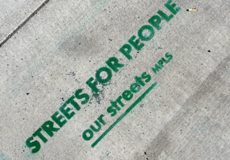 streets for people our streets mpls stencil on sidewalk