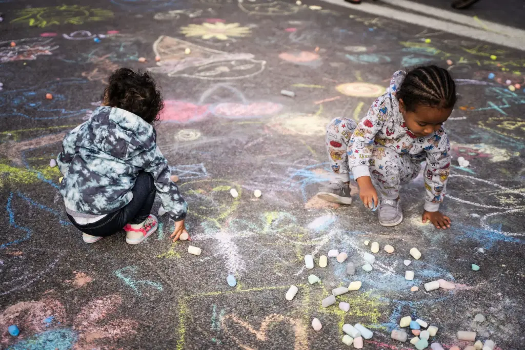 Kids playing with chalk