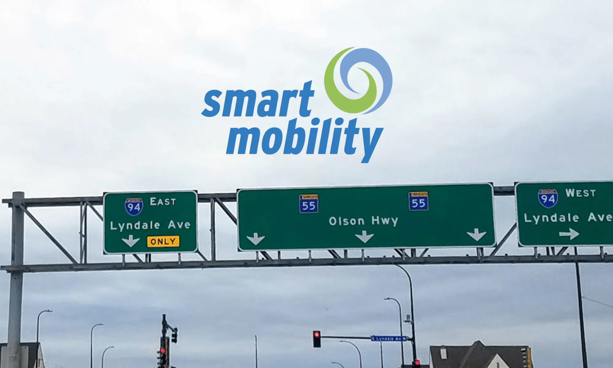 smart mobility logo over image of Olson Memorial Highway sign