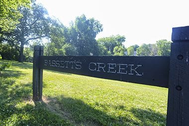 Basset's Creek Park sign.