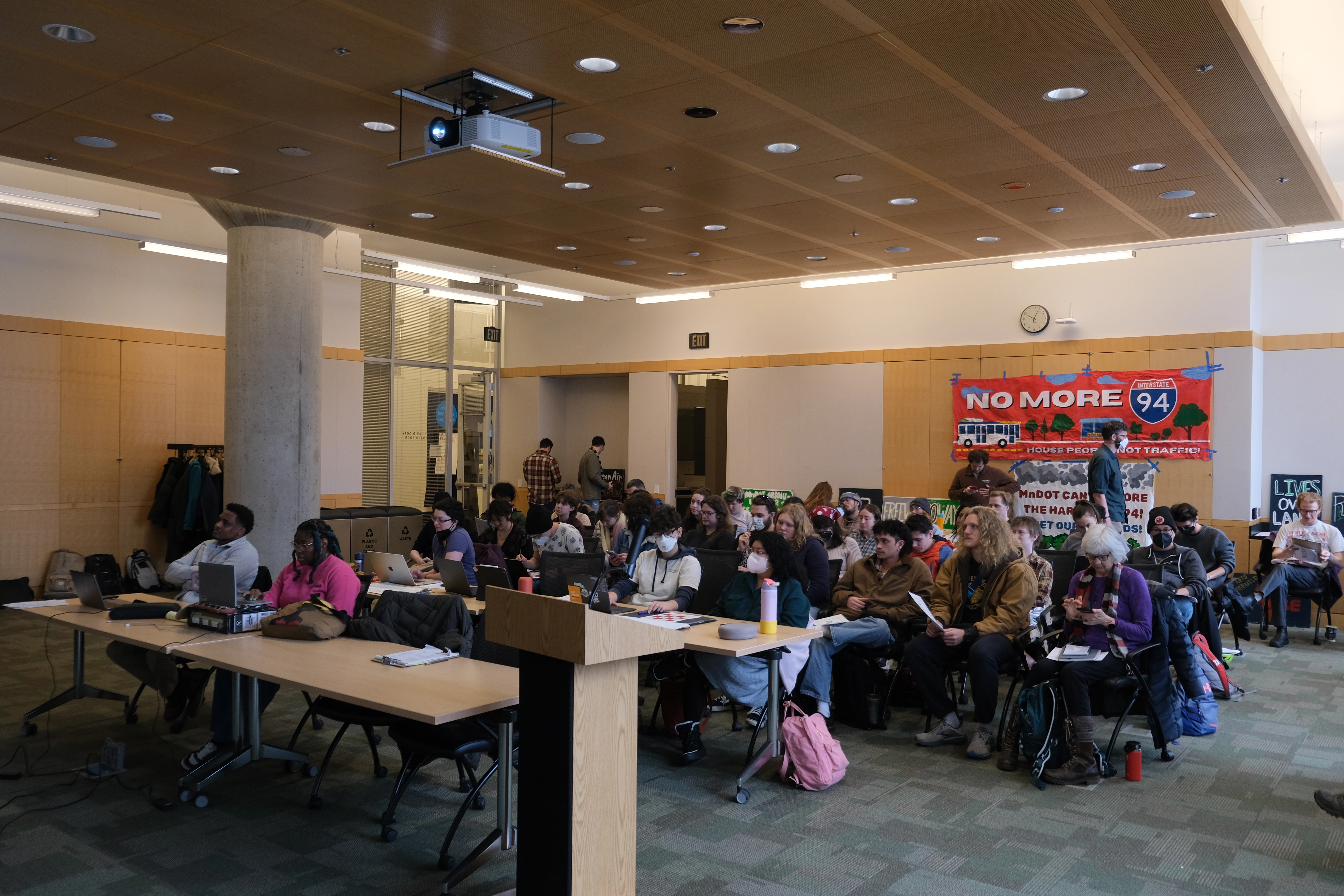 Twin Cities Boulevard supporters at Minnesota Department of Transportation's (MnDOT) Rethinking I-94 Policy Advisory Committee (PAC) meeting with Our Streets.