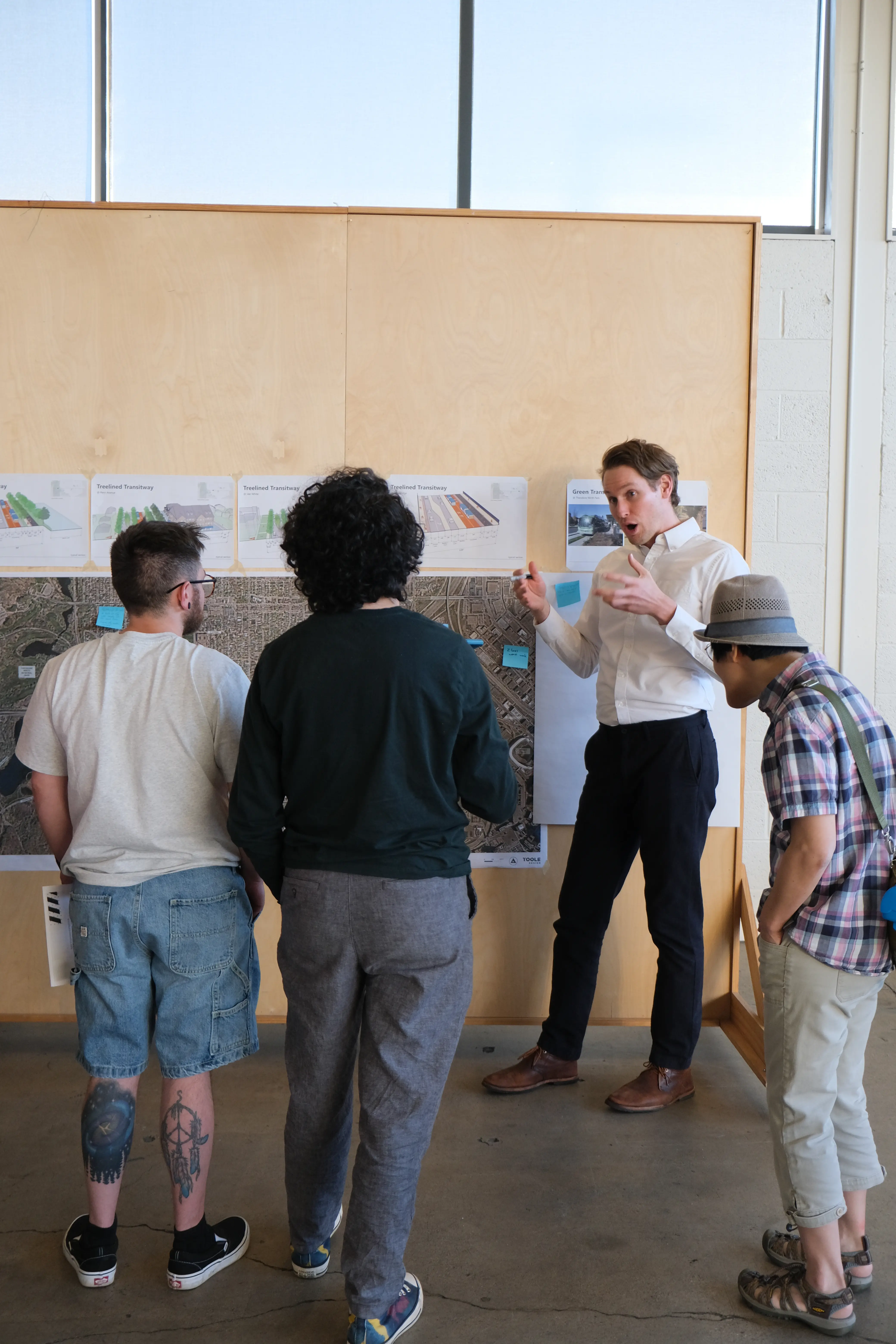 Alex McKeag of Toole Design talks to attendees about one of the design options.