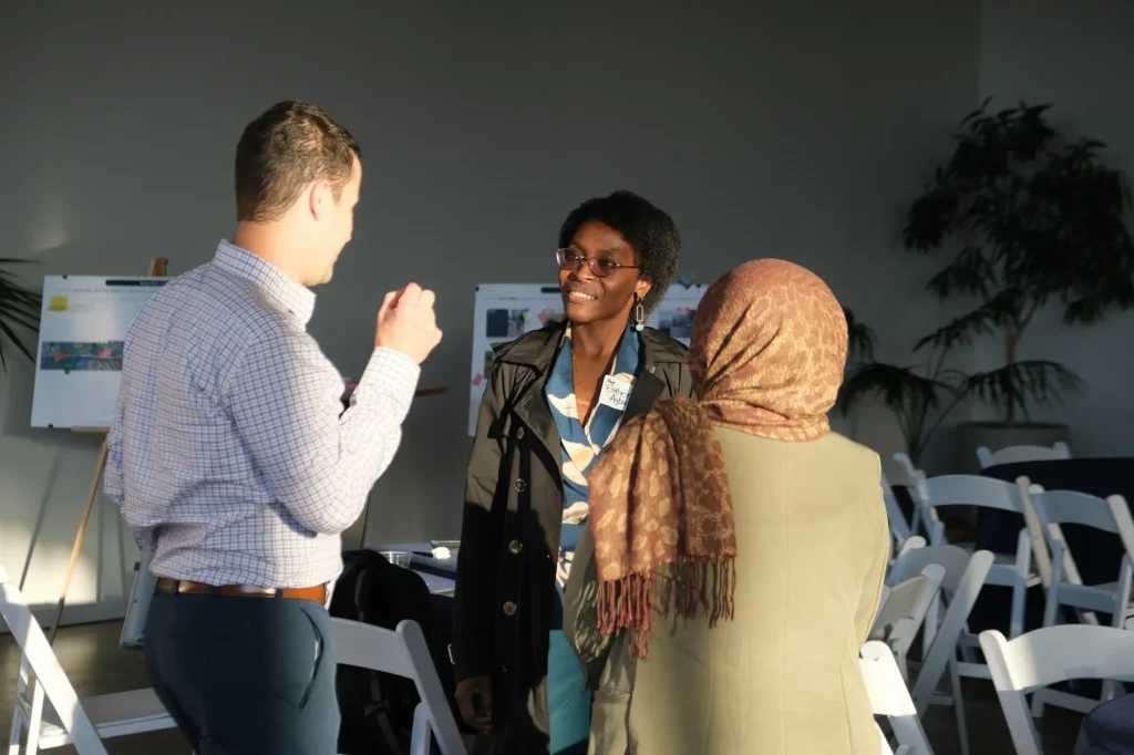 Attendees chat with Minnesota House Representative Esther Agbaje, District 59B.